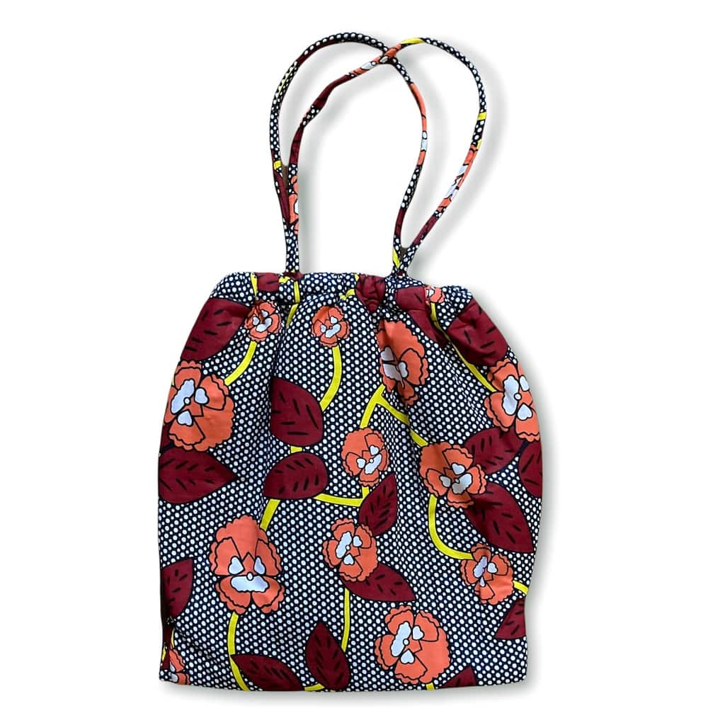 ワックスプリント巾着型バッグ - PINK/RED FLOWER - Borderless Creations